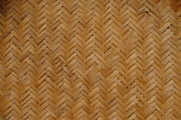 The surface of the woven bamboo. bamboo Wicker. bamboo can be used for crafts, including for coating household furniture. This woven bamboo gives a geometric shape.