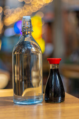 bottle on a table with colourful Bokeh in the background in a Restaurant in Sydney CBD NSW Australia 