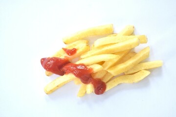 French fries mixed with salt dipping ketchup on white background