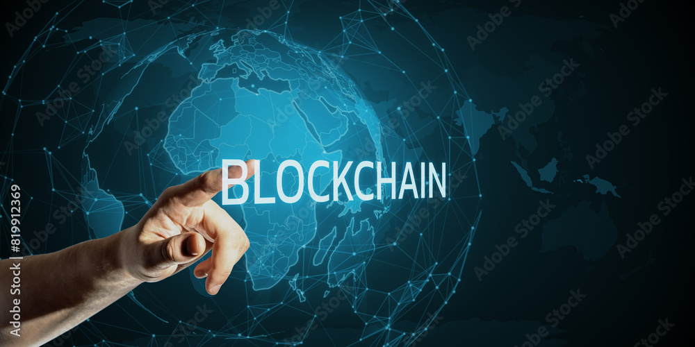 Poster a hand touching the word 'blockchain' with a digital world map in the background, representing the c