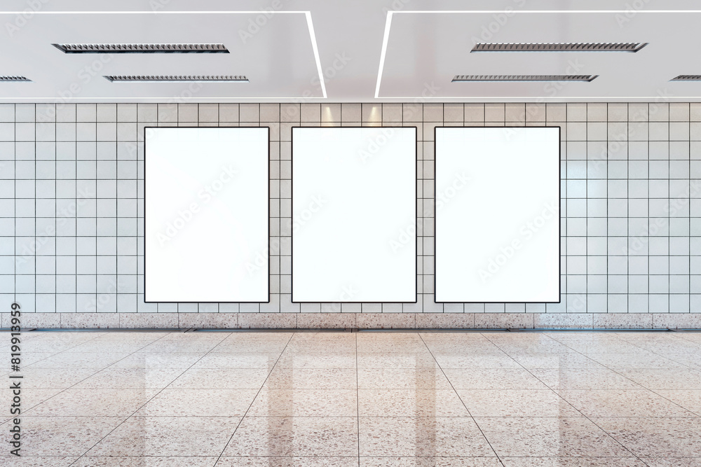 Poster three vertical billboard mockups in a subway station, on a tiled wall with a glossy floor, concept o