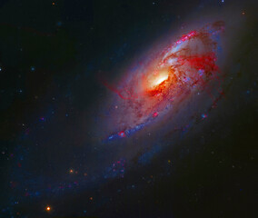 M106, Spiral Galaxy in Canes Venatici. Digital enhancement of an image by NASA