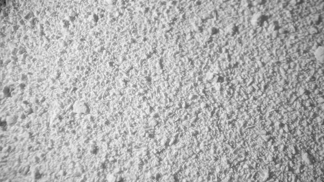Close-up: Tiny, ivory tapioca flakes, born from cassava root. They whisper tales of thickening soups and adorning puddings, a culinary secret unveiled in their delicate form.
