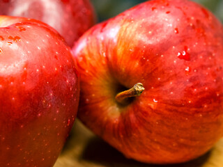 Wet Apple Freshness. Detailed view of wet apples, apt for culinary arts or nutrition education.