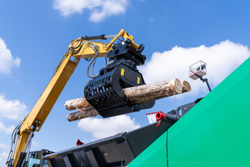 Loading of timber. Loader close up