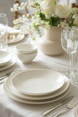 Elegant Spring Table Setting with White Daisies and Sunlight