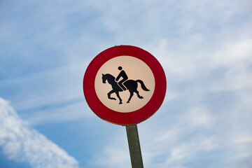 Horse Riding Prohibition Sign Against Clear Sky