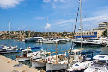 Fototapeta na wymiar Beach harbor and houses of Porto Cristo Mallorca, Porto Cristo, Mallorca.