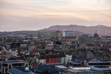 Edinburgh Scotland: 13th Feb 2024: Edinburgh cityscape and rooftops view from Carlton Hill lookout point at dusk. Business Gateway Edinburgh