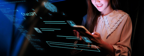 Businesswoman using smartphone with ChatGPT interactive online information chatting system, artificial intelligence internet web conversation computer robot data technology, openAi digital development