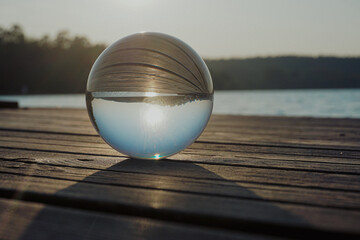 Close up of a crystal ball at a lake