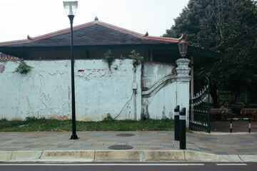 Golden hour casts a warm glow on the historic architecture of Yogyakarta, where tradition meets modernity in every corner.