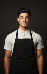Naklejka premium A man in a kitchen apron. Chef work in the cuisine. Cook in uniform, protection apparel. Job in food service. Professional culinary. Black fabric apron, casual stylish clothing. Baker. Generated AI