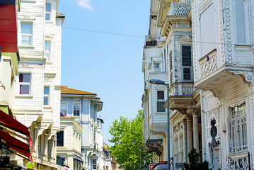 A picturesque street with beautiful old wooden houses in the Arnavutkoy district of Istanbul. Yalı...