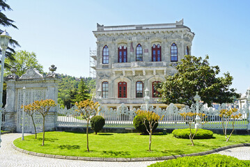 View of the side facade of the Küçüksu Pavilion, the Sultan's residence built in the Ottoman Baroque style in the 19th century. Sights on the banks of the Bosphorus - Istanbul, Türkiye.