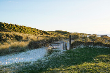 A wooden gate for access to a beach on the isle of Iona. Iona is a small island of the Inner Hebrides in the west of Scotland.