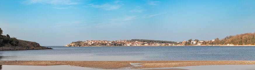 A distant panoramic view of Kerpe in a beautiful sunny weather with a simple view of the sea. Kerpe, Kocaeli, Türkiye.