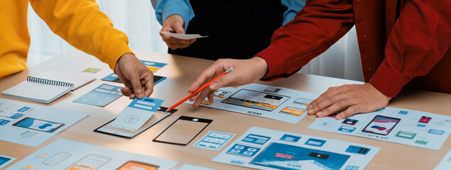 Panorama banner of startup company employee planning on user interface prototype for mobile...
