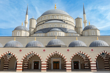 A beautiful front view of its dome from the outside of the 18 March Hatime Ana Grand Mosque in Canakkale. Architectural details in its dome.