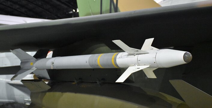 An Air Force AIM-9 Sidewinder missile on an F-111 Aardvark jet fighter. The Sidewinder is an air-to-air missile designed for dog-fighting.
