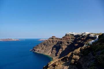 Panoramic view of rock formation and ruins of Skaros Rock near the greek village of Imerovigli...