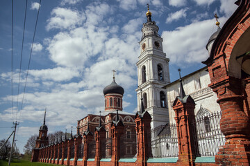 View of russian architecture, church architectural complex, white clouds