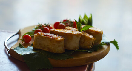 small tomatoes and lavash on the board