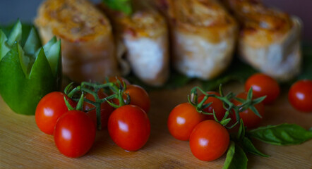 small tomatoes and lavash on the board