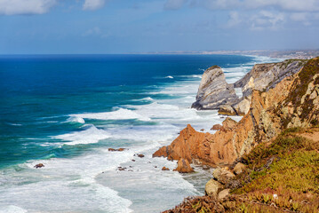 Aerial view of the amazing natural landscape of the Atlantic Ocean, the westernmost point of Europe - Cabo da Roca, Portugal