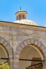 A beautiful cross-sectional view of Karacabey Imaret Mosque, showing the arched historical...