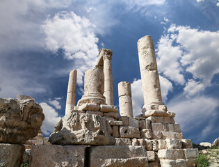 Amman city landmarks-- old roman Citadel Hill, Jordan. Against the background of a beautiful sky with clouds