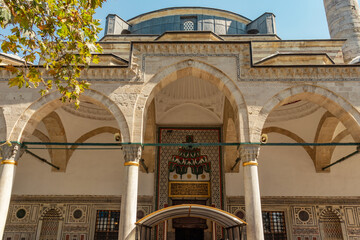 A beautiful detail view of the main entrance of the Çoban Mustafa Paşa Mosque.