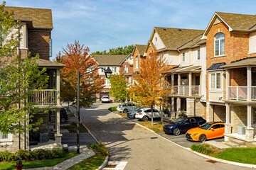 Residential townhouses. Modern apartment buildings in Ontario, Canada. Real estate development,...