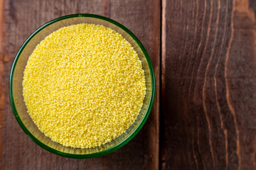 crumbly couscous cereal in a glass bowl on the table
