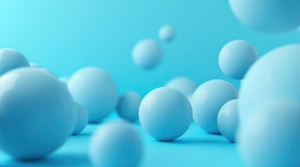 3D rendering of various-sized blue spheres floating or bouncing against a monochromatic blue background, conveying a sense of simplicity and calm