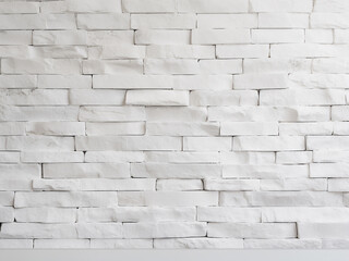 Obraz premium White brick wall background, providing a sleek canvas for design endeavors