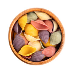 Five-color conchiglie, Italian pasta in a wooden bowl. Round, shell shaped and furrowed, uncooked...
