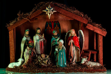 Christmas christian scene. Religious Christmas nativity scene of baby Jesus in the manger with...