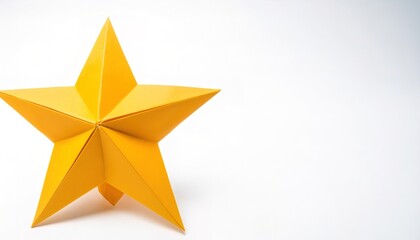 Christmas holiday or astrological concept paper origami isolated on white background of a star like the ones that go on top of a Christmas tree, with copy space, simple starter craft for kids