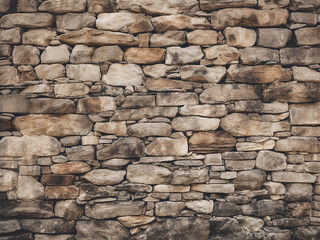 Fototapeta premium Aged brick texture defines ancient stone wall background