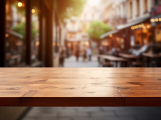 Empty wooden table with a blurred caf? background