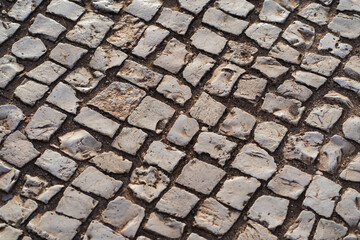 Photo background texture of an old calzada on the streets of Lisbon in Portugal.