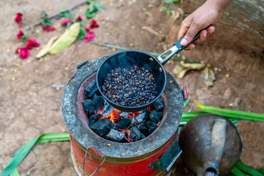 Ethiopia, fresh coffee beans  are rosted in a pan in the  area of Sidama.