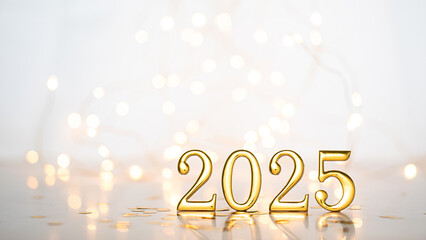 Obraz na płótnie Canvas Golden numbers displaying 2025 on a reflective surface with a festive bokeh background, symbolizing celebration and the upcoming new year.