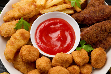 Chicken nuggets, Southern strips, Chicken fingers, french fries, chips, various sauces and beer