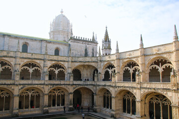 Obraz premium Mosteiro dos Jerónimos de Santa Maria de Belém, It is a former monastery of the Order of Saint Jerome and is located in the Belén neighborhood, and Igreja de Santa Maria de Belém in Lisbon, Portugal.