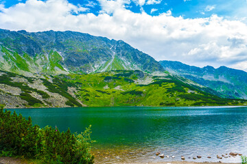 Tatra National Park in Poland. Mountains lake Morskie oko or Sea Eye lake In High Tatras. Five lakes valley © etraveler