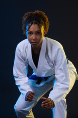 Brazilian girl Jujutsu fighter is ready for the Jiu Jitsu wrestling competition. Brazilian sport ju-jitsu. Mixed martial arts.