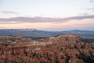 Soft Pink Light Over Winding Trails into Bryce Canyon