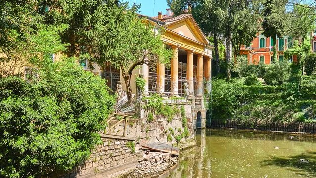 Loggia, situated inside Salvi Garden, rises on waters of Seriola. Valmarana Salvi gardens are public garden located in historic center of Vicenza, Italy, adjacent to walls of Piazza Castello.